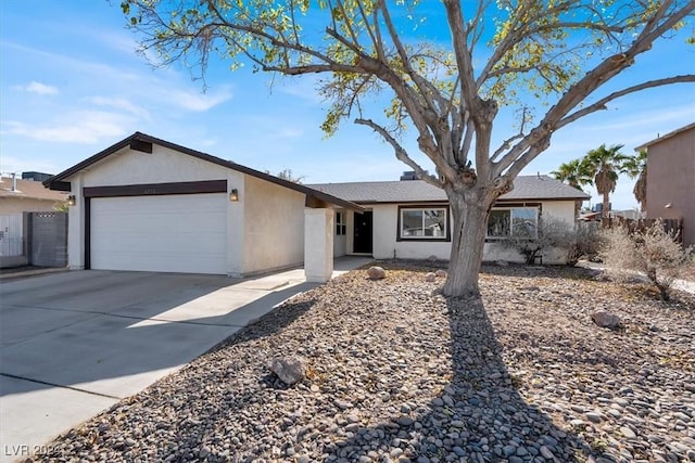 ranch-style house featuring a garage