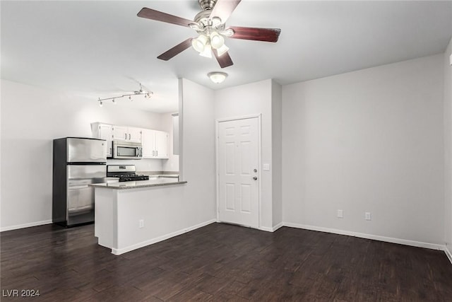 kitchen featuring ceiling fan, dark wood-type flooring, kitchen peninsula, white cabinets, and appliances with stainless steel finishes