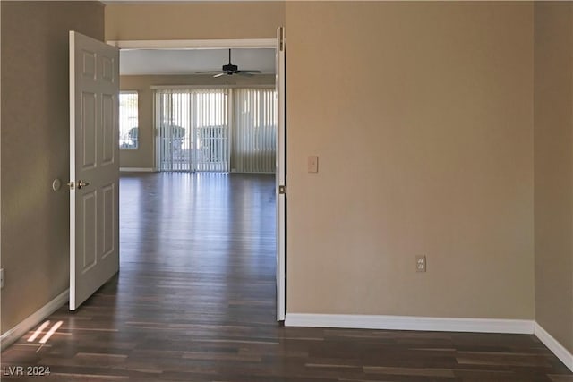 corridor with dark hardwood / wood-style floors