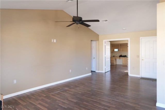 empty room with dark hardwood / wood-style floors, ceiling fan, and lofted ceiling