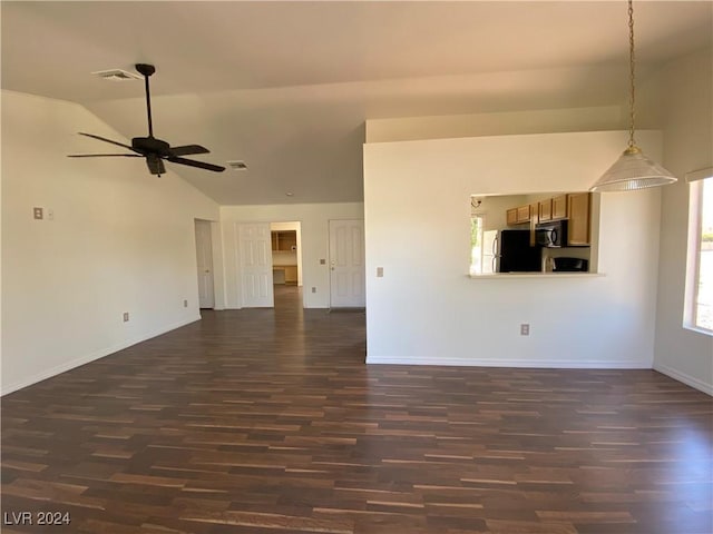 unfurnished living room with a ceiling fan, dark wood-style flooring, lofted ceiling, and visible vents