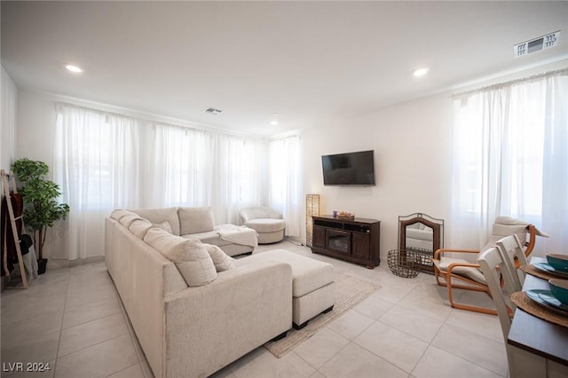 living room featuring light tile patterned flooring