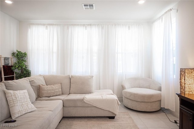 living room with light tile patterned floors