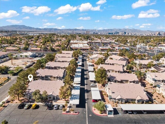 drone / aerial view featuring a mountain view