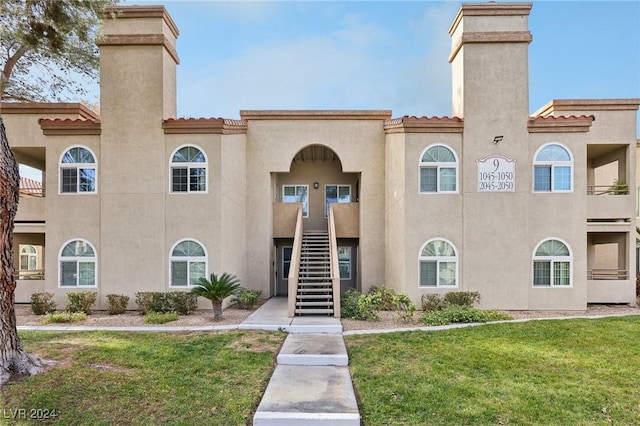 view of building exterior featuring stairway