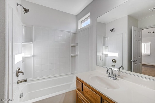 bathroom with shower / tub combination and vanity