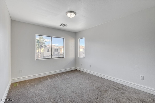 empty room featuring carpet floors