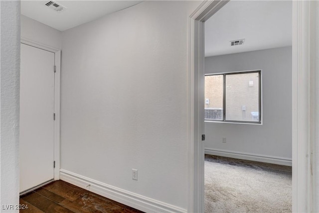 hall featuring dark hardwood / wood-style flooring