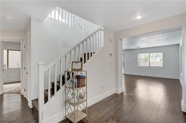 stairway with wood-type flooring