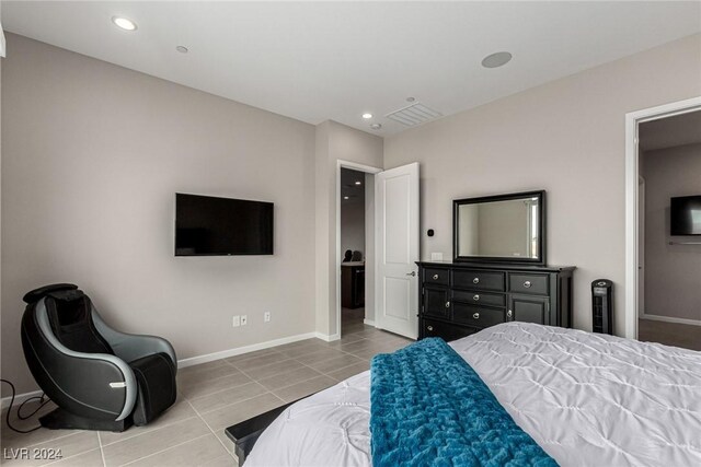 bedroom featuring tile patterned flooring