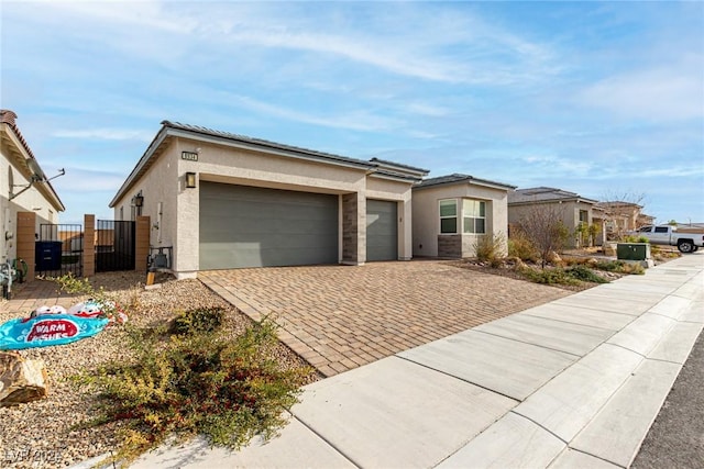 single story home featuring a garage