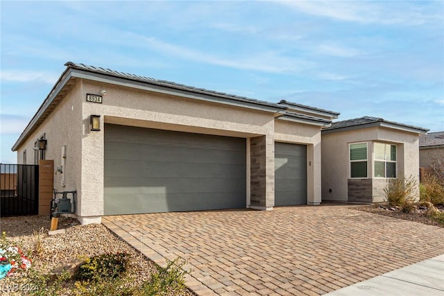 view of front of home featuring a garage