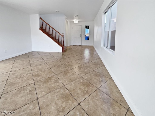 entrance foyer featuring light tile patterned floors