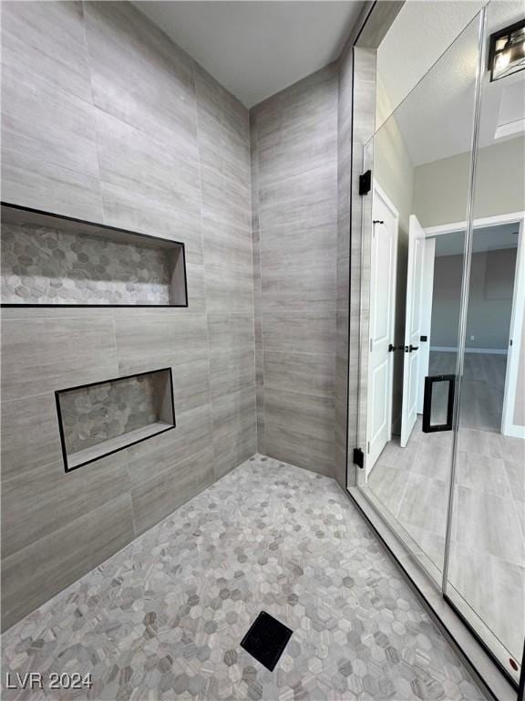 bathroom with a shower