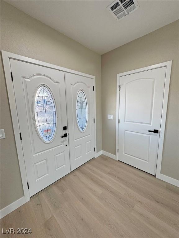 foyer featuring light wood-type flooring