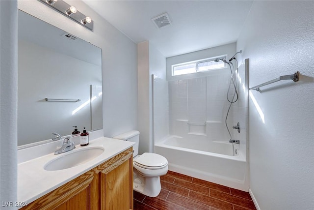 full bathroom featuring vanity, shower / bathing tub combination, and toilet