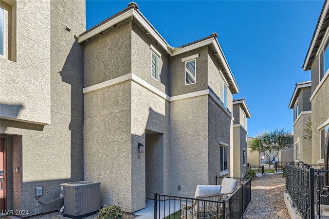 view of property exterior with central air condition unit