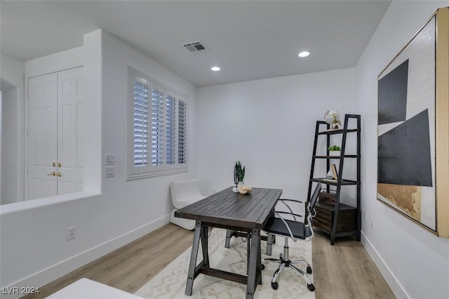 office space featuring light hardwood / wood-style floors