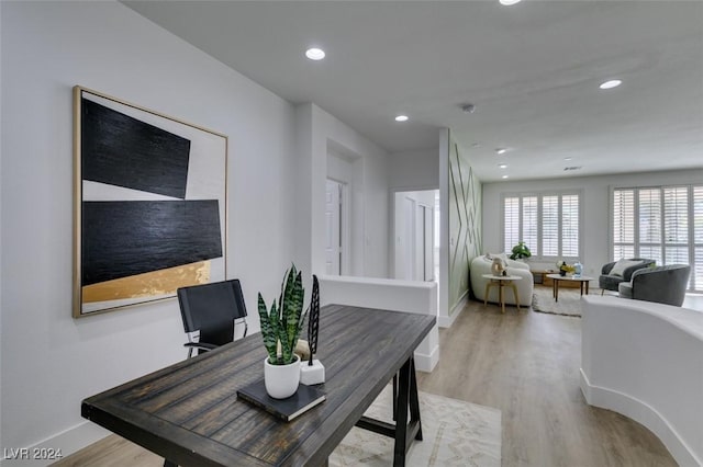 dining room with light hardwood / wood-style flooring