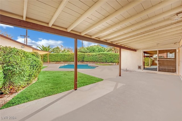 view of patio / terrace featuring a fenced in pool