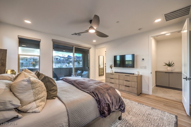 bedroom with access to outside, ceiling fan, and light hardwood / wood-style flooring