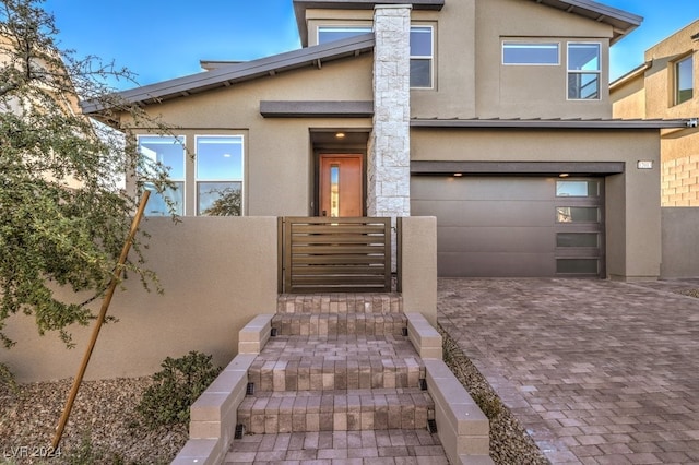 view of front of home with a garage