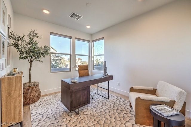 office area with light wood-type flooring