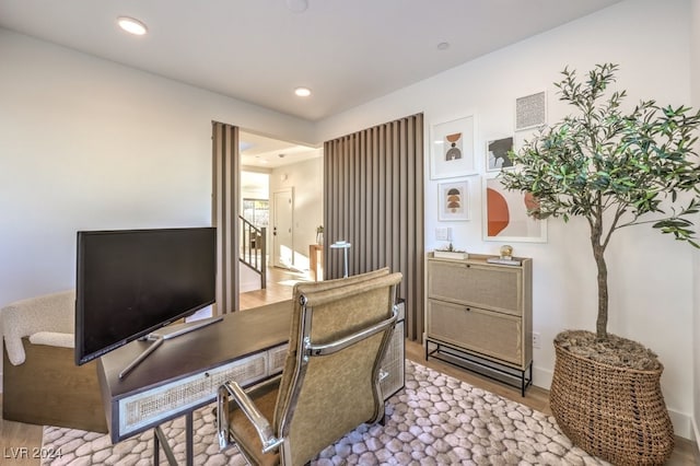 office space featuring hardwood / wood-style floors