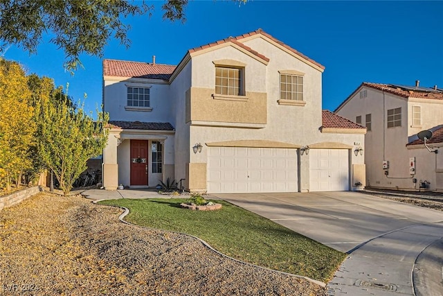 mediterranean / spanish-style house featuring a garage