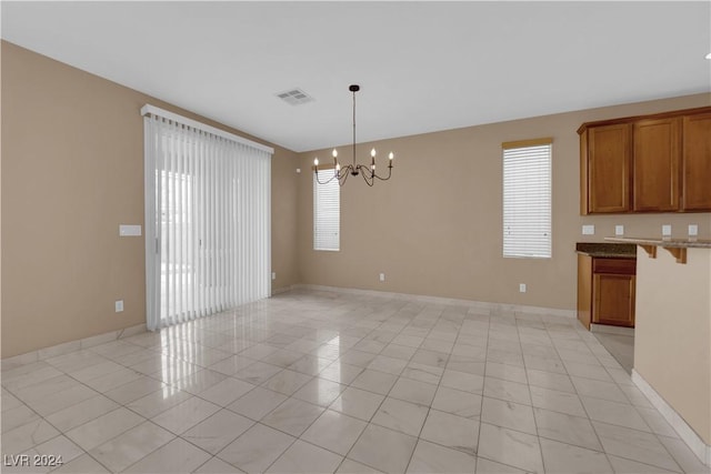 interior space featuring an inviting chandelier