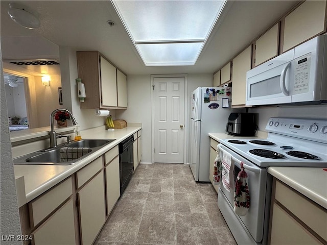 kitchen with white appliances and sink