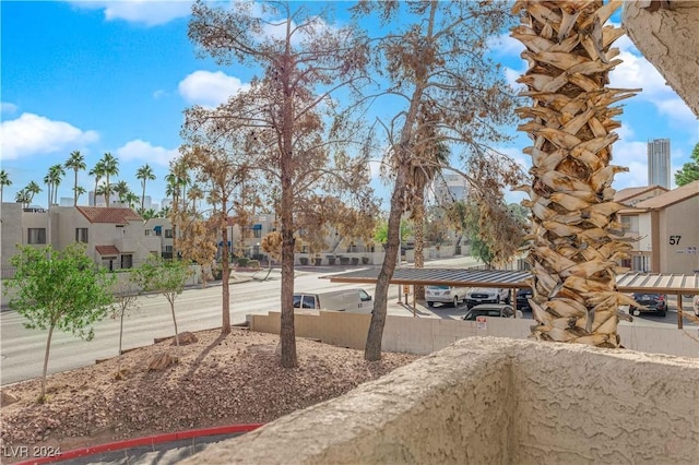 exterior space with a carport