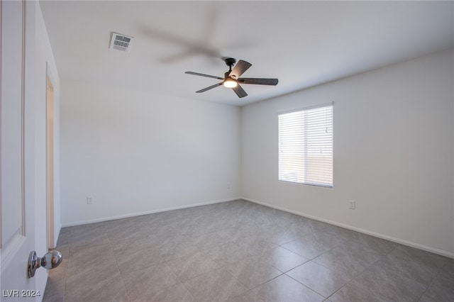 unfurnished room featuring ceiling fan