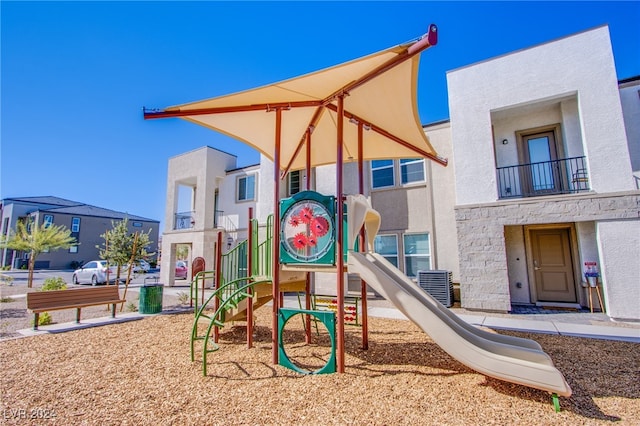 view of play area with central air condition unit