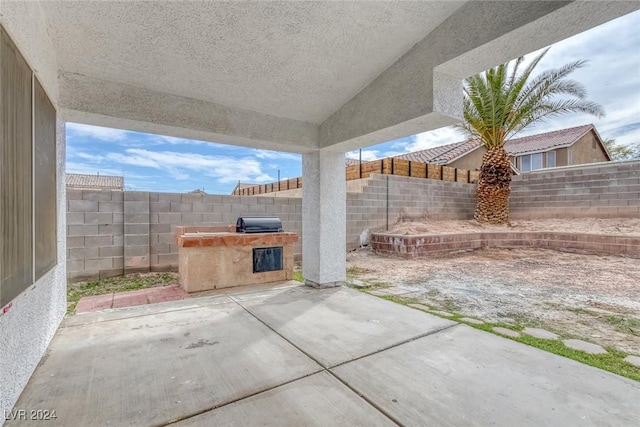 view of patio / terrace featuring a grill