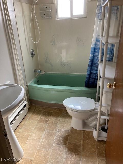 bathroom with shower / bath combination with curtain, toilet, and a baseboard radiator