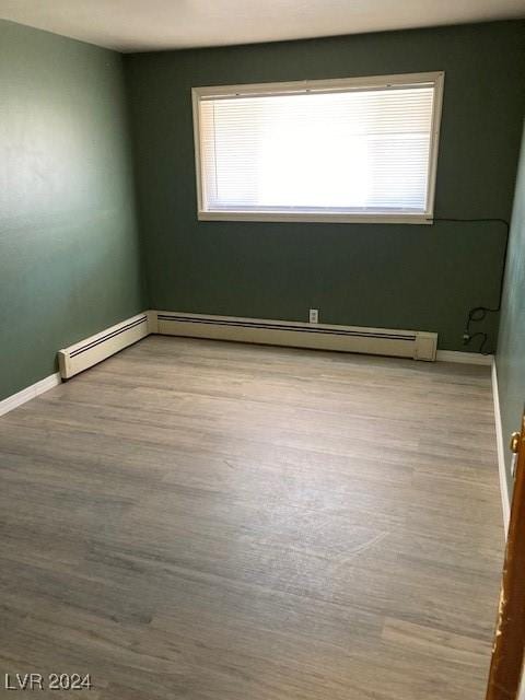 empty room featuring light hardwood / wood-style floors