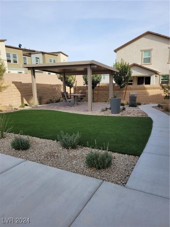 view of yard with a patio area and cooling unit