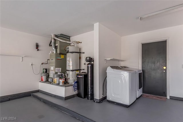 washroom with independent washer and dryer