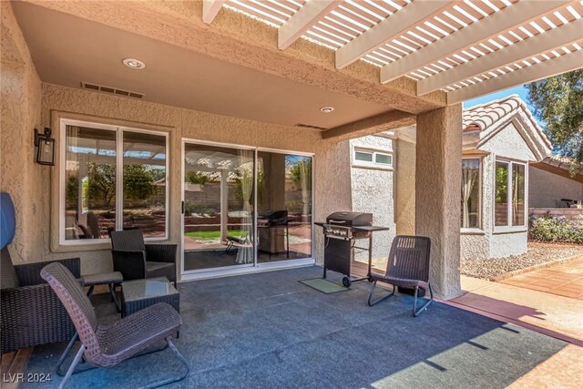 8705 Villa Ridge Dr, Las Vegas, NV 89134 - view of patio / terrace with grilling area and a pergola