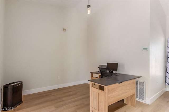 home office featuring light hardwood / wood-style flooring