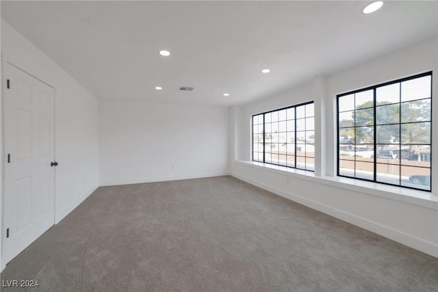 empty room featuring carpet floors