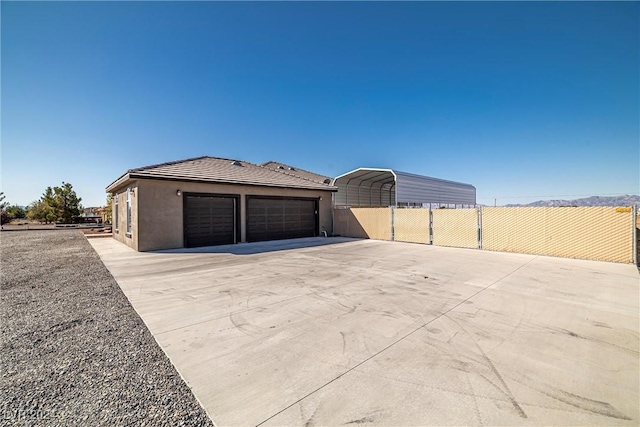 garage with a carport