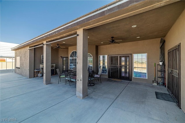 view of patio with ceiling fan