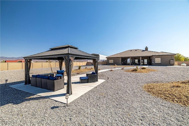 view of yard with an outdoor hangout area, a gazebo, and a patio