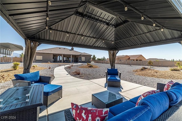 view of patio / terrace with a gazebo and an outdoor hangout area