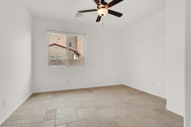 spare room featuring ceiling fan