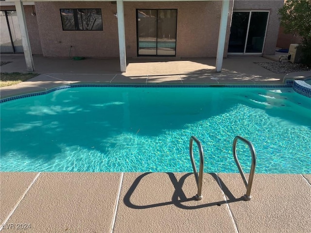 pool featuring a patio