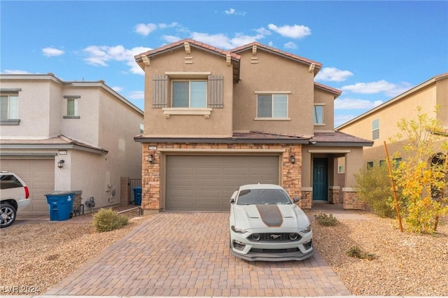 view of front of home with a garage