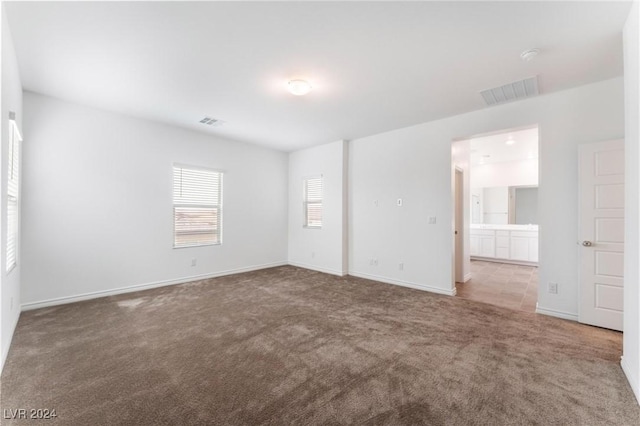 view of carpeted spare room